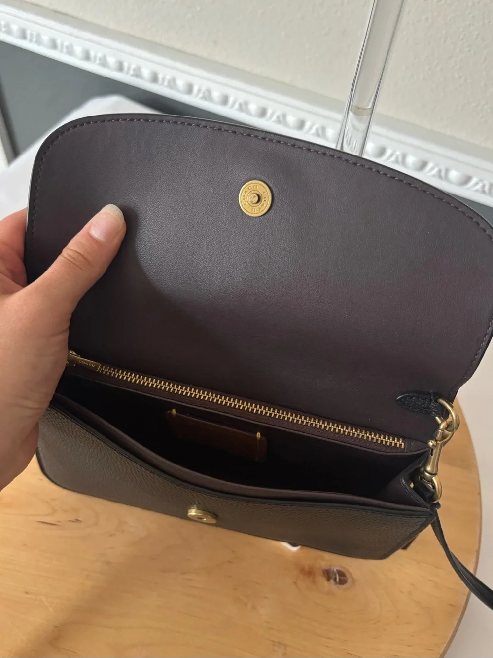 Coach compact pebbled